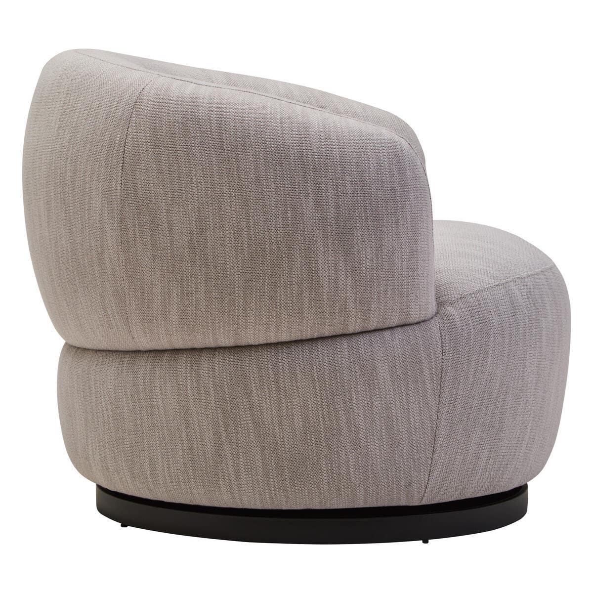 Light grey swivel accent chair with textured upholstery and black circular base, side view