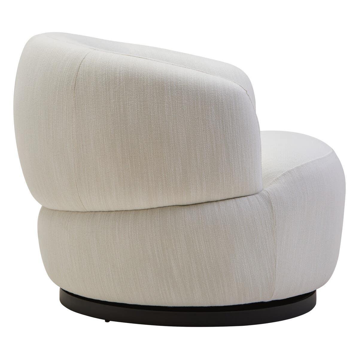 Cream fabric swivel chair with curved backrest and black circular base, side view