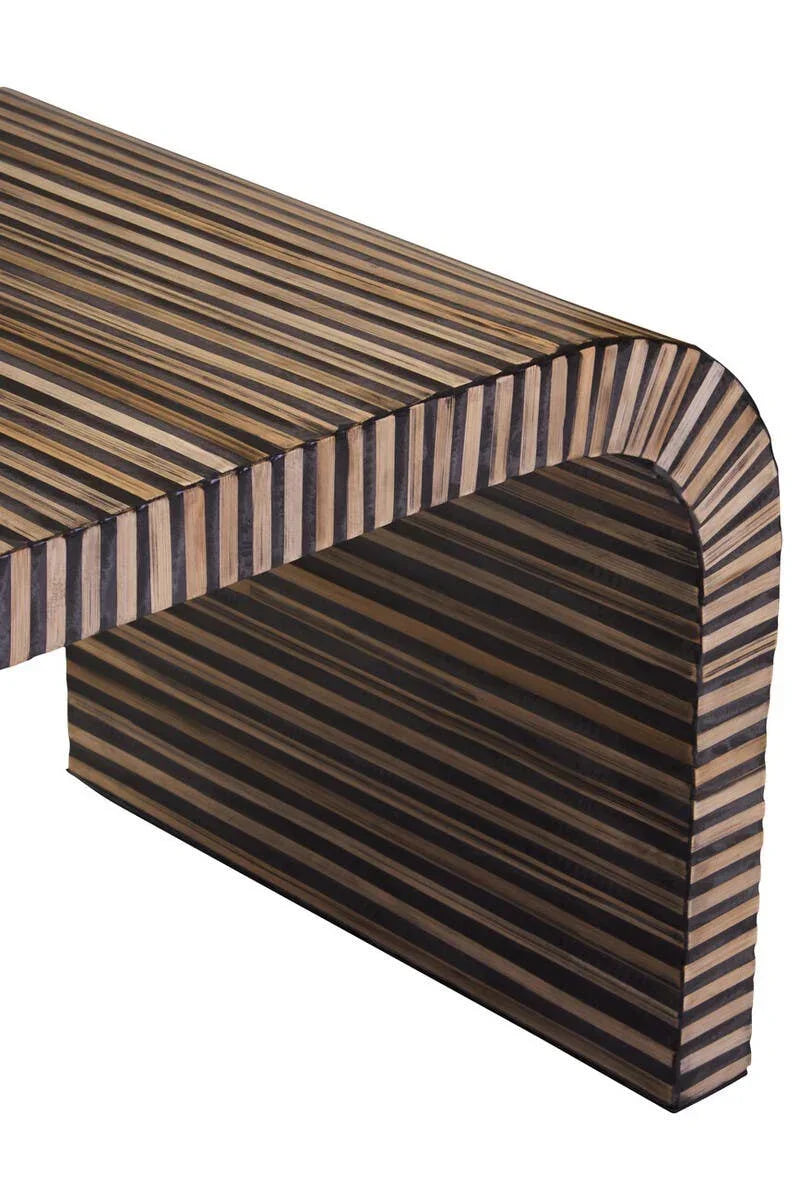 Striped wood coffee table with curved edges, close-up on table corner and surface detailing