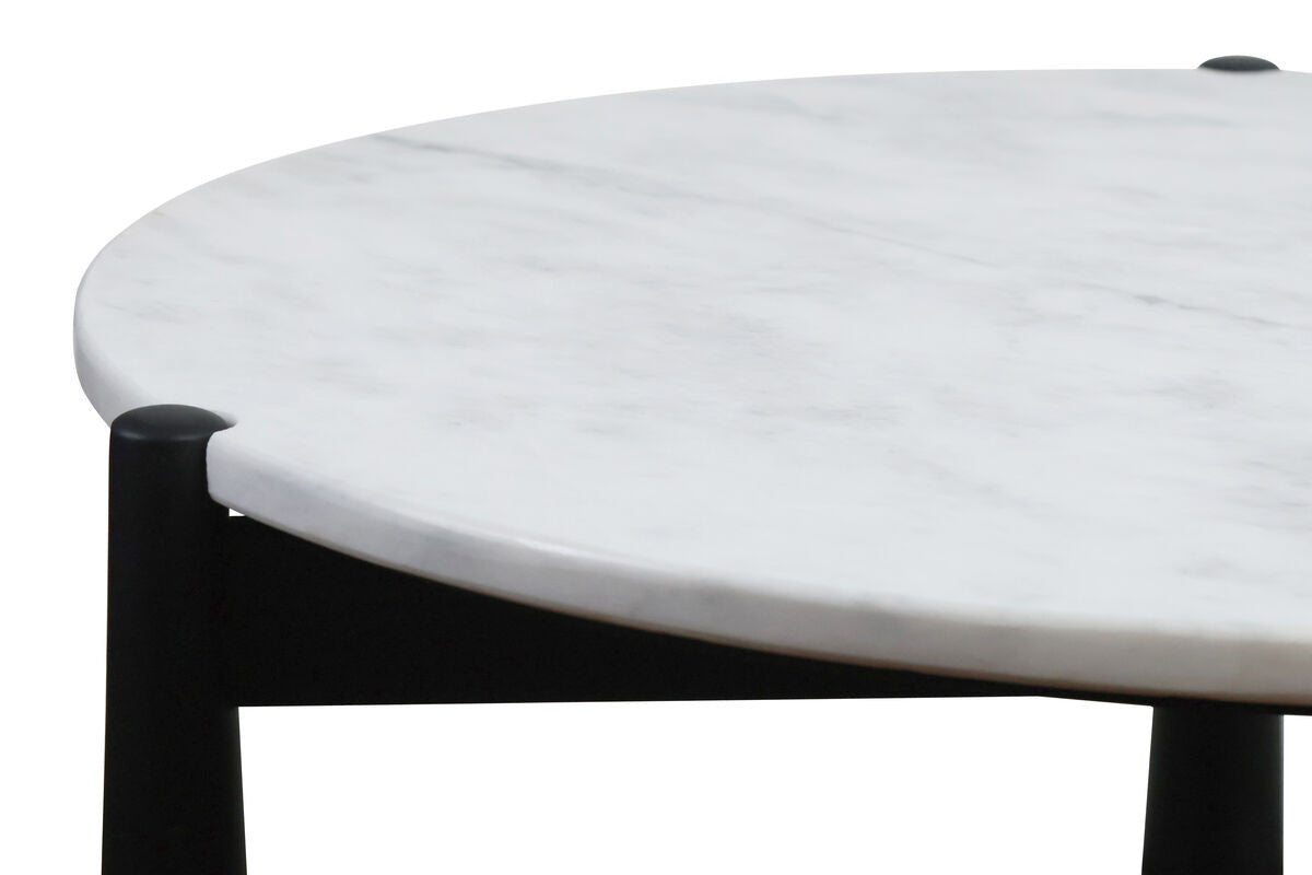 Round coffee table featuring a smooth white marble top with subtle gray veining, supported by a sturdy black mango wood frame.