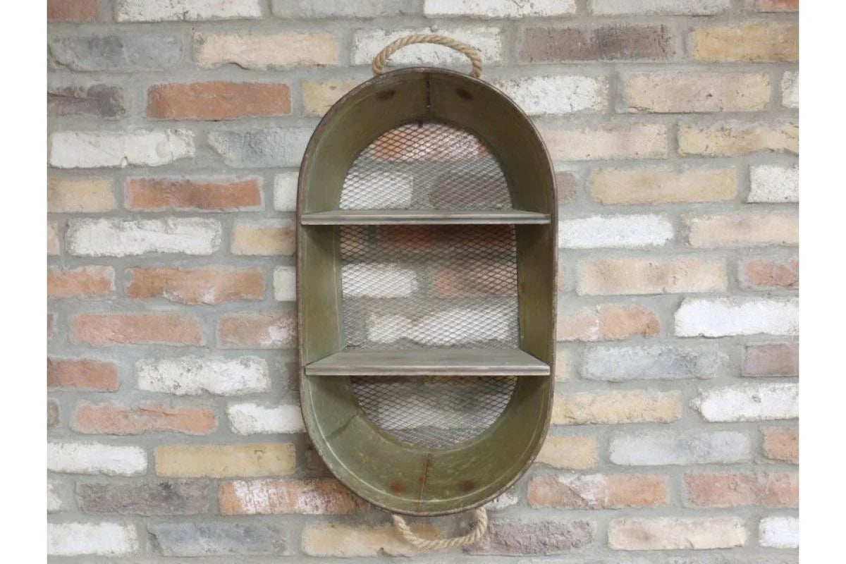 Oval metal wall shelf with mesh back and rope handle on brick wall