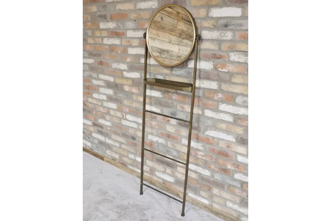 Industrial ladder mirror with shelf and metal frame against exposed brick wall