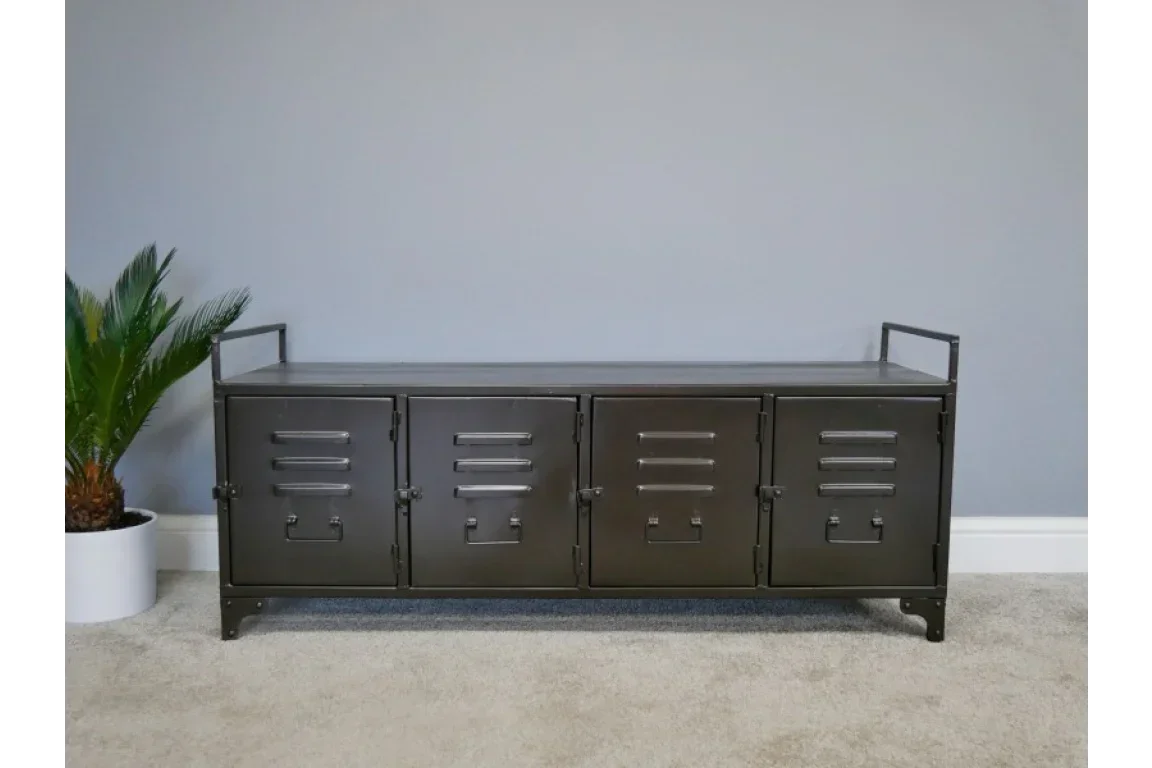 Black metal storage sideboard with four locker doors, placed against a light grey wall