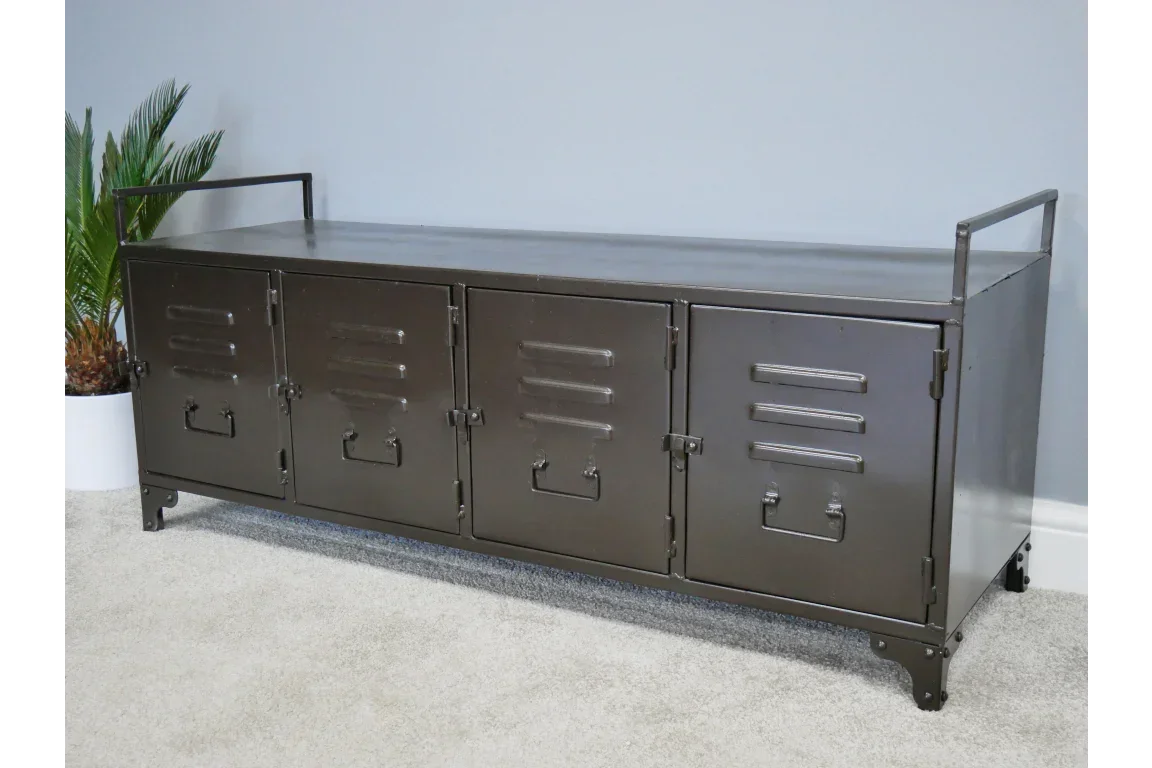 Industrial metal sideboard with four locker style doors and handles on carpeted floor