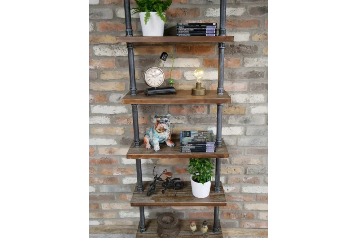 Industrial style shelving unit with wood shelves, metal frame, books, plants, and decor