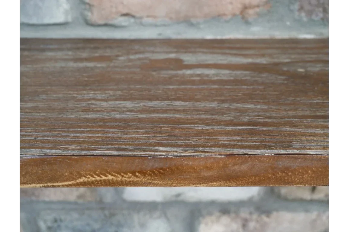 Close-up of wooden furniture shelf with natural grain and smooth edge