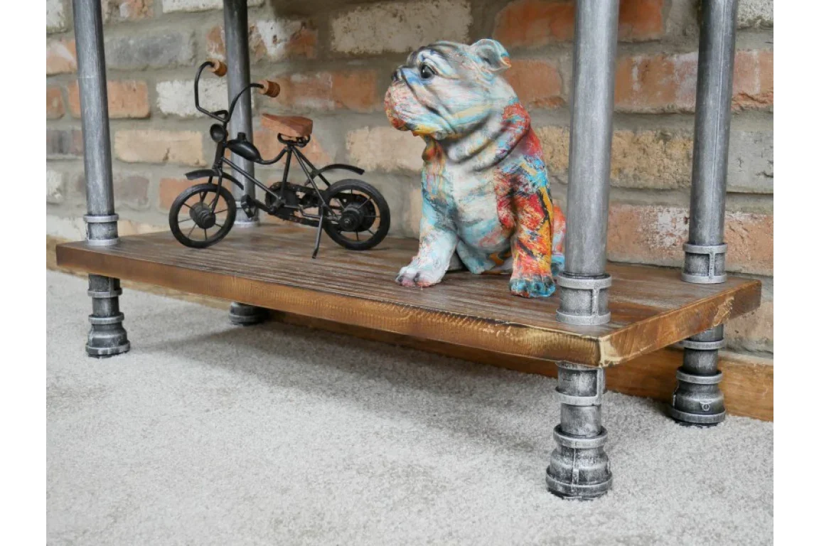 industrial style wooden shelf with metal legs, bulldog ornament, and miniature bicycle decor
