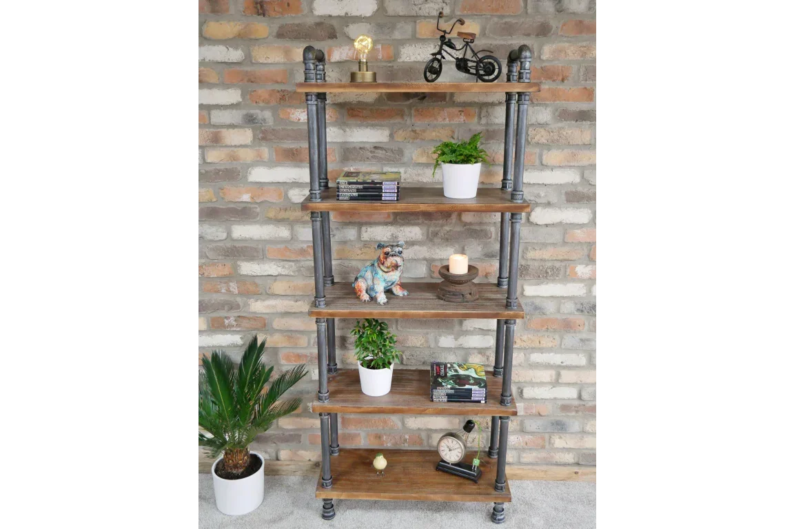 Industrial style wooden bookcase with metal frame, potted plants, and decor items