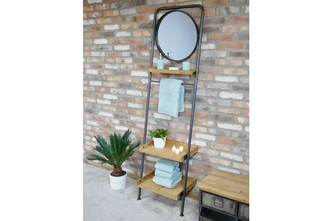 Industrial ladder shelf unit with mirror, wooden shelves and towels against brick wall