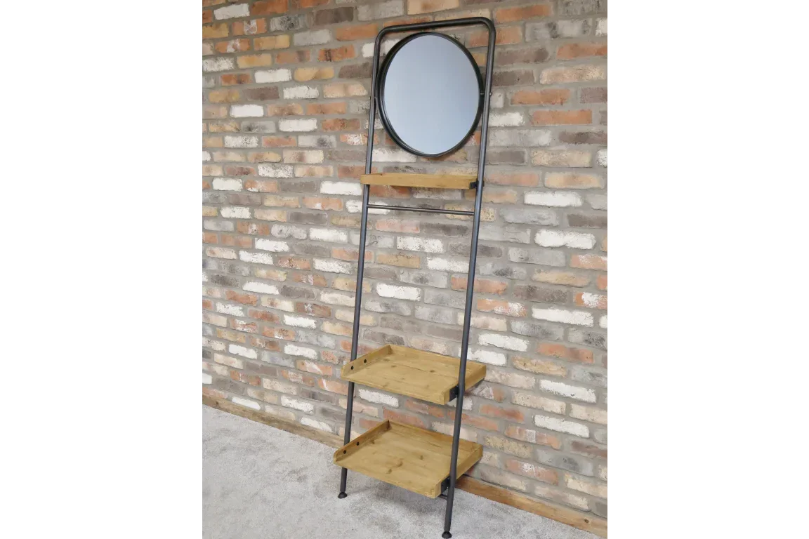Ladder shelf unit with black metal frame, round mirror, and three wooden shelves