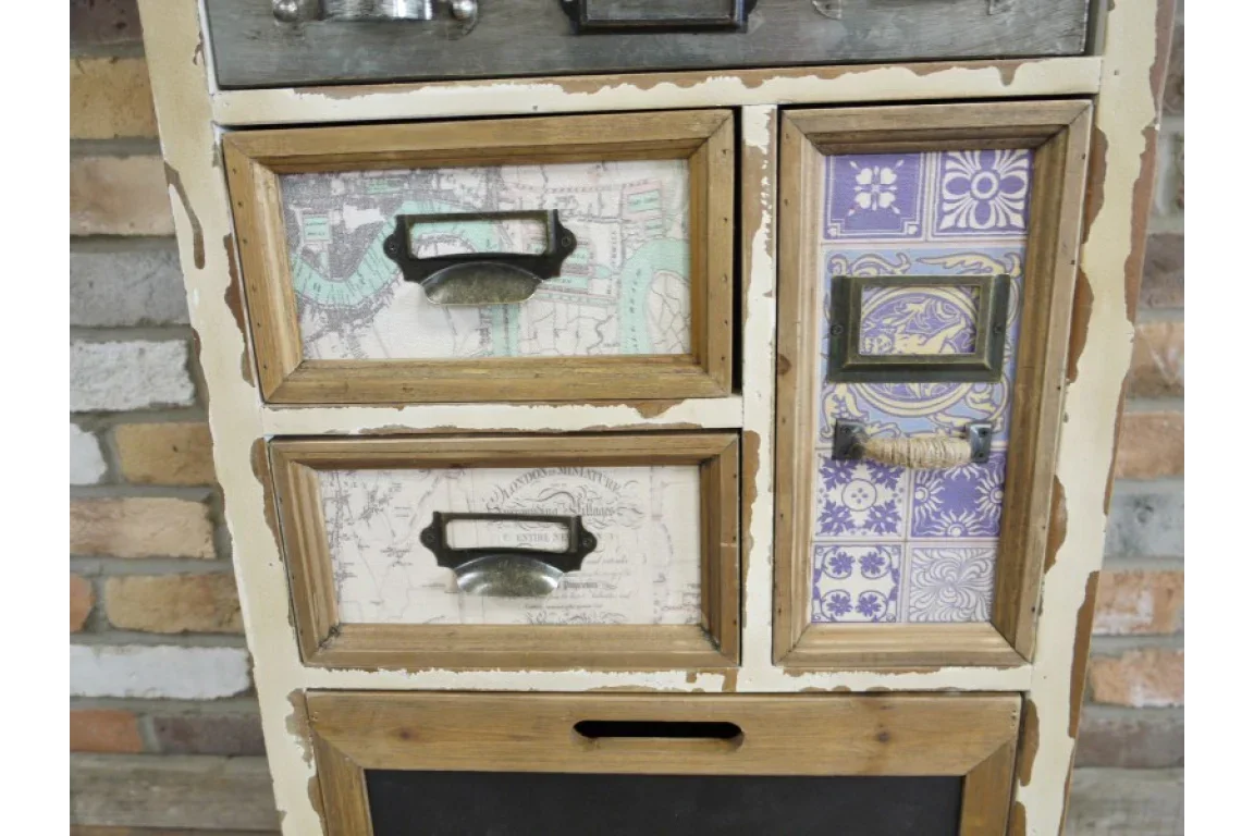 Rustic wooden chest of drawers with map and tile pattern fronts and metal handles