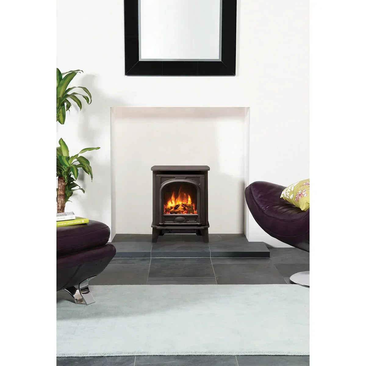 Electric stove heater with faux flame in modern living room, set on grey tiled floor