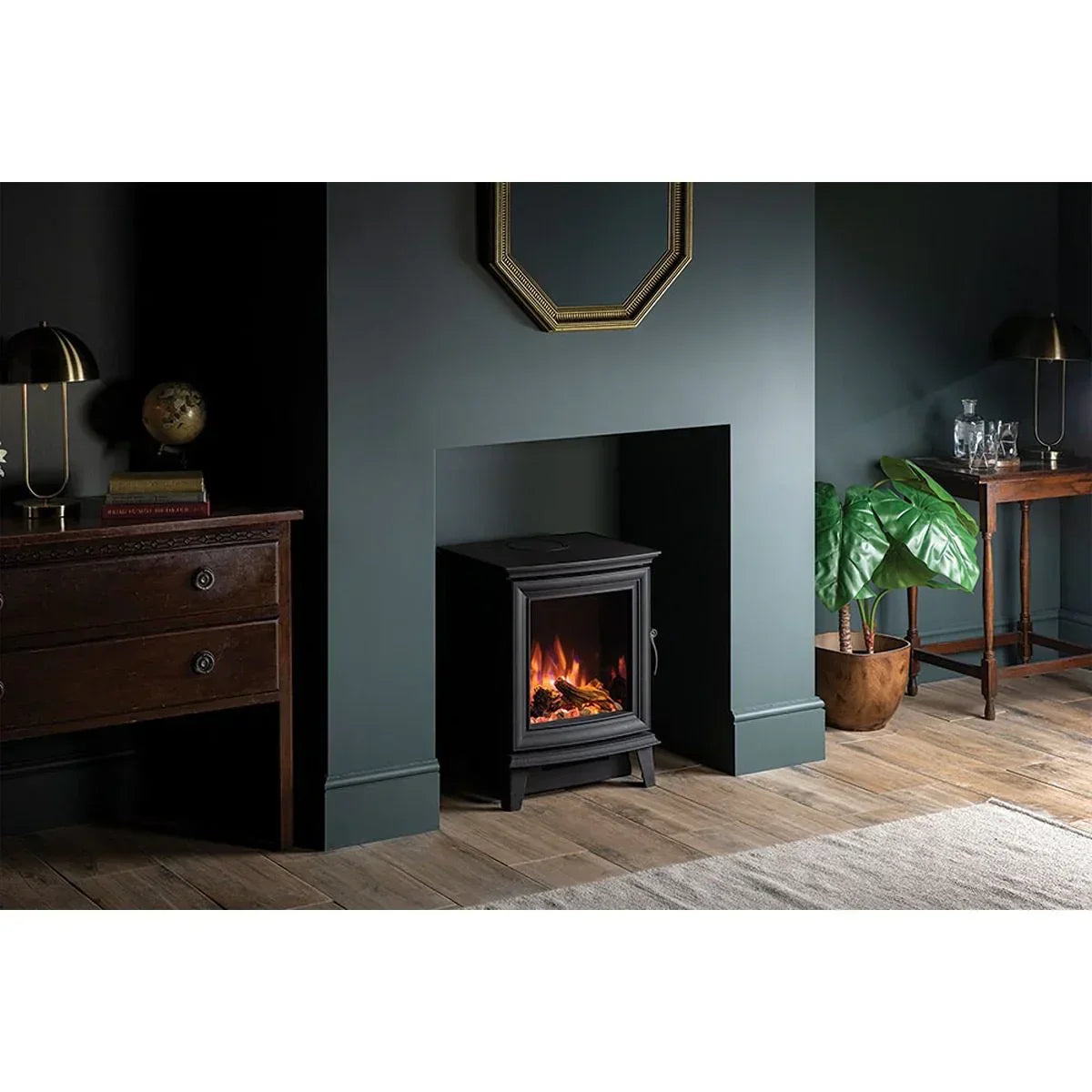 Black electric stove heater with realistic flame effect in modern living room fireplace setting