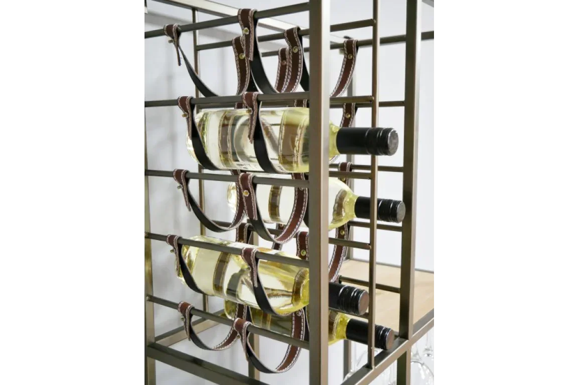 metal wine rack with leather straps holding bottles of white wine horizontally