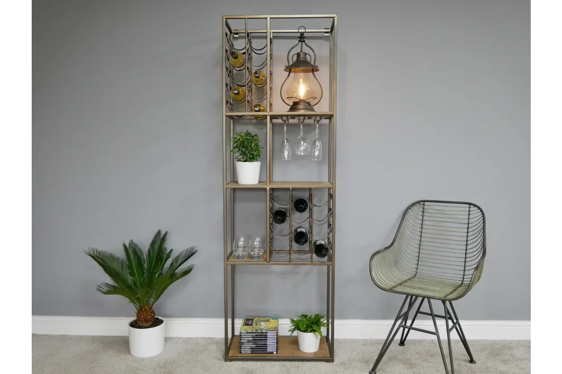 Tall metal wine rack shelving unit with bottles, glasses, lantern and potted plants