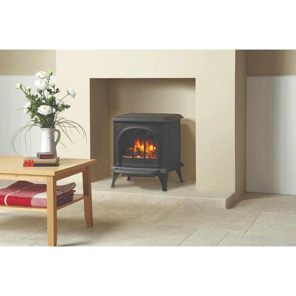 Black electric stove heater with flame effect in modern living room fireplace setting
