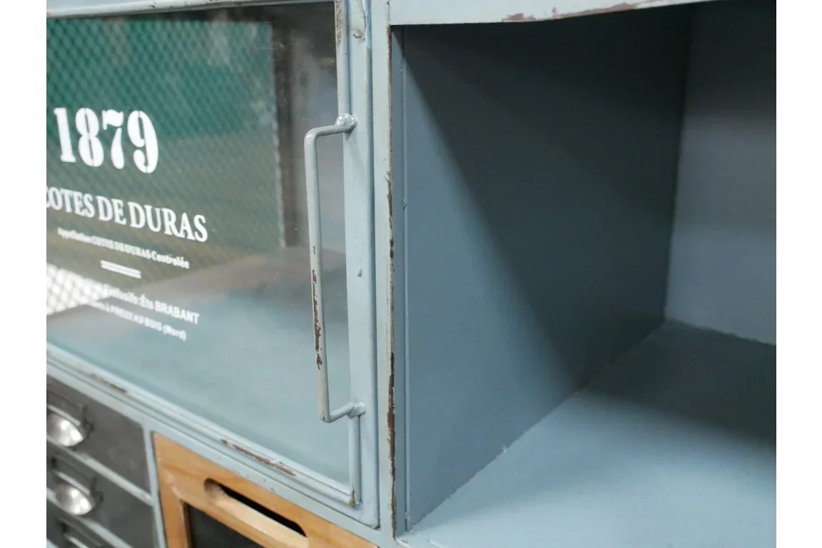 Industrial metal cabinet with glass door, vintage lettering and open storage shelf