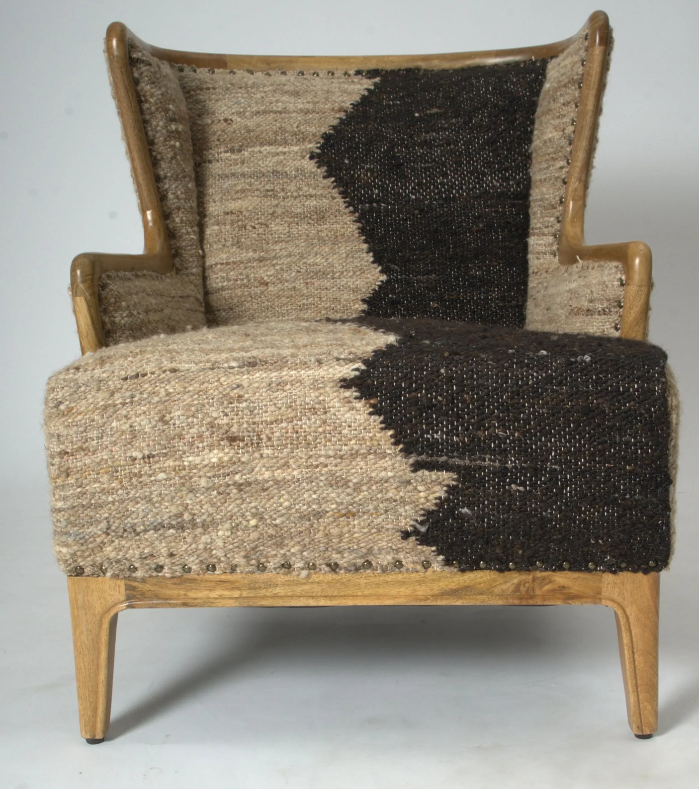 Textured armchair with wood frame and beige and dark brown woven upholstery, front view