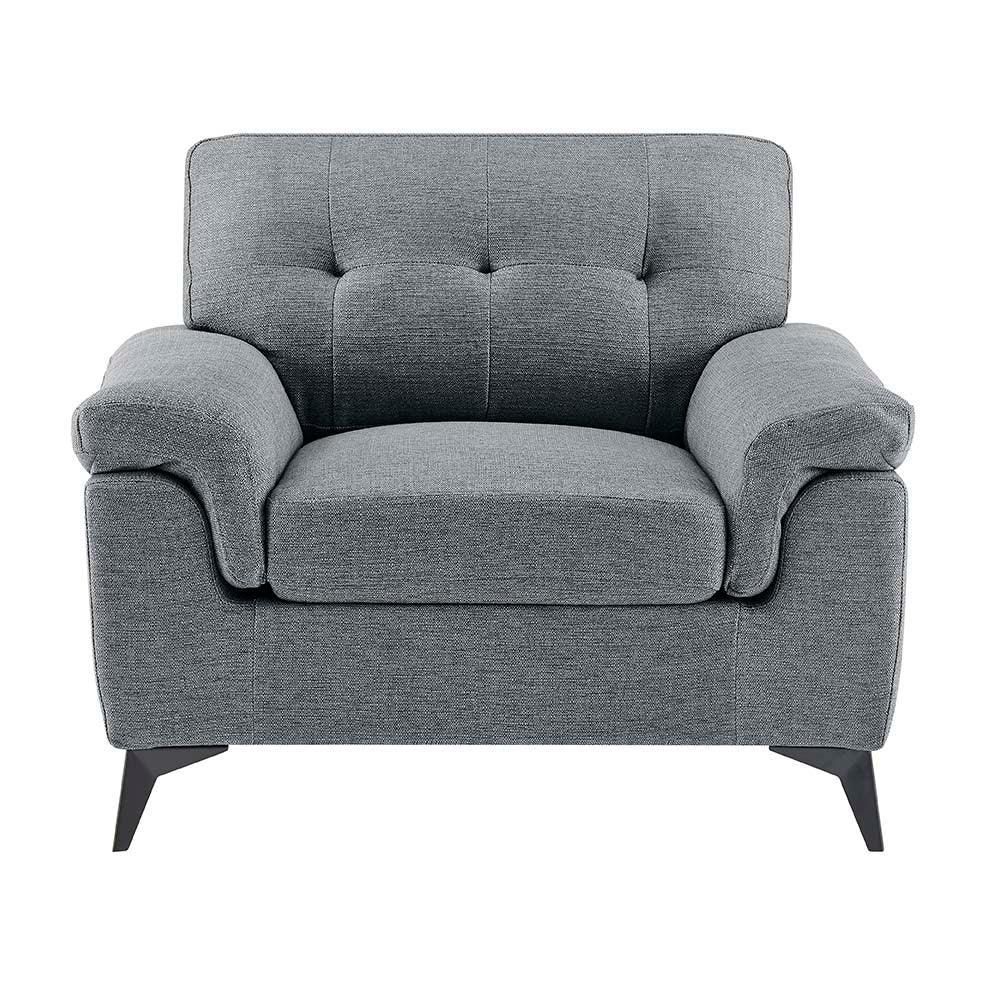 Grey fabric armchair with tufted backrest and angled black legs, front facing view