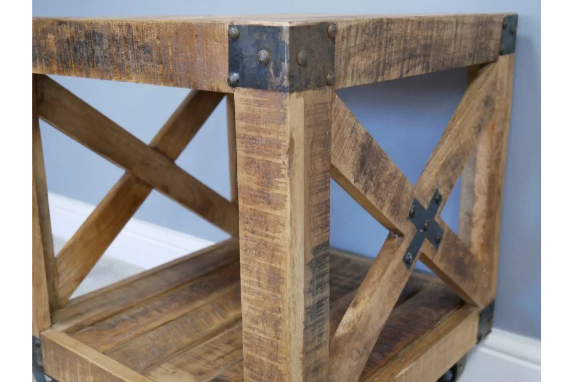 Rustic wooden coffee table with metal corner brackets and lower shelf detail