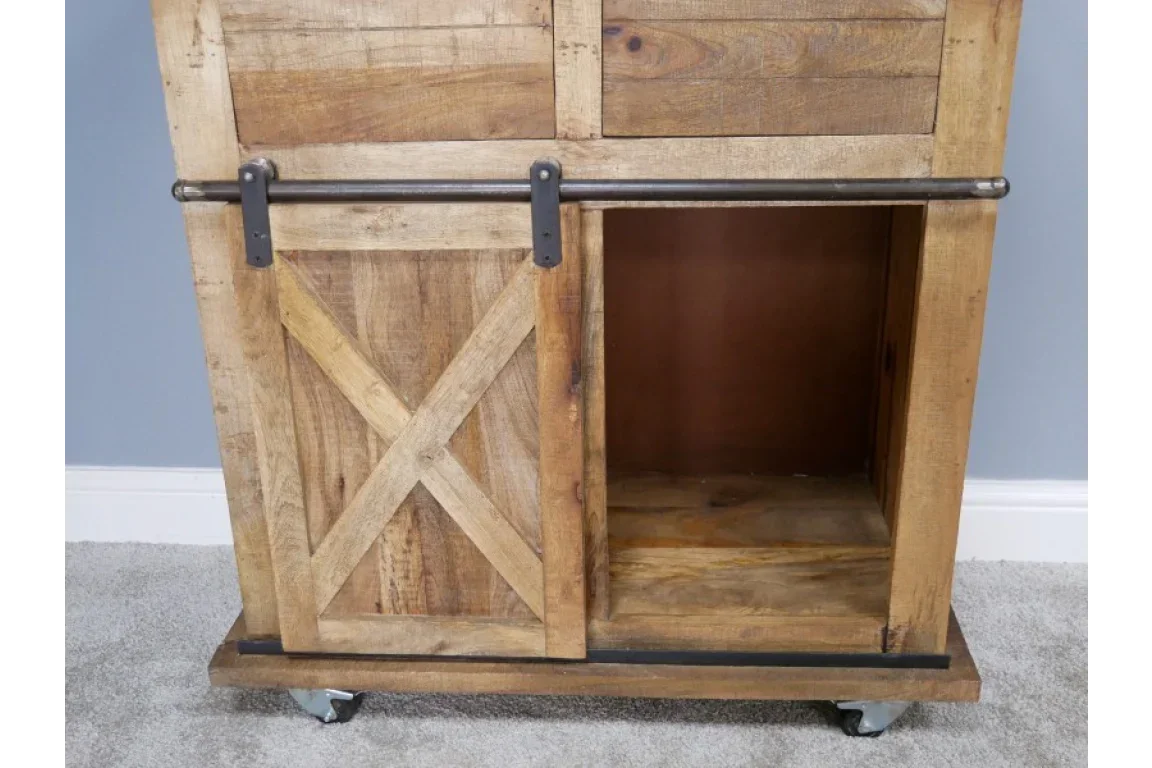 Rustic wooden sideboard with sliding barn door and metal rail on castor wheels