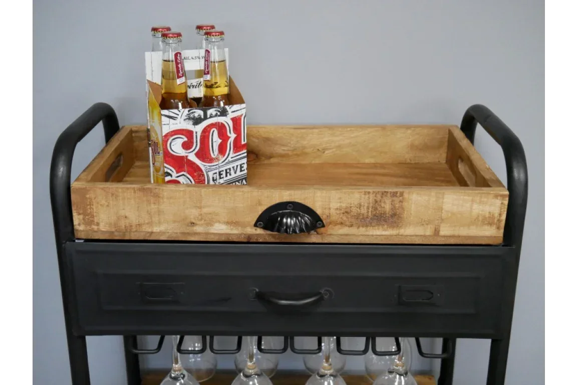 Industrial bar cart with black frame, wooden tray, glass holders, and drinks on top