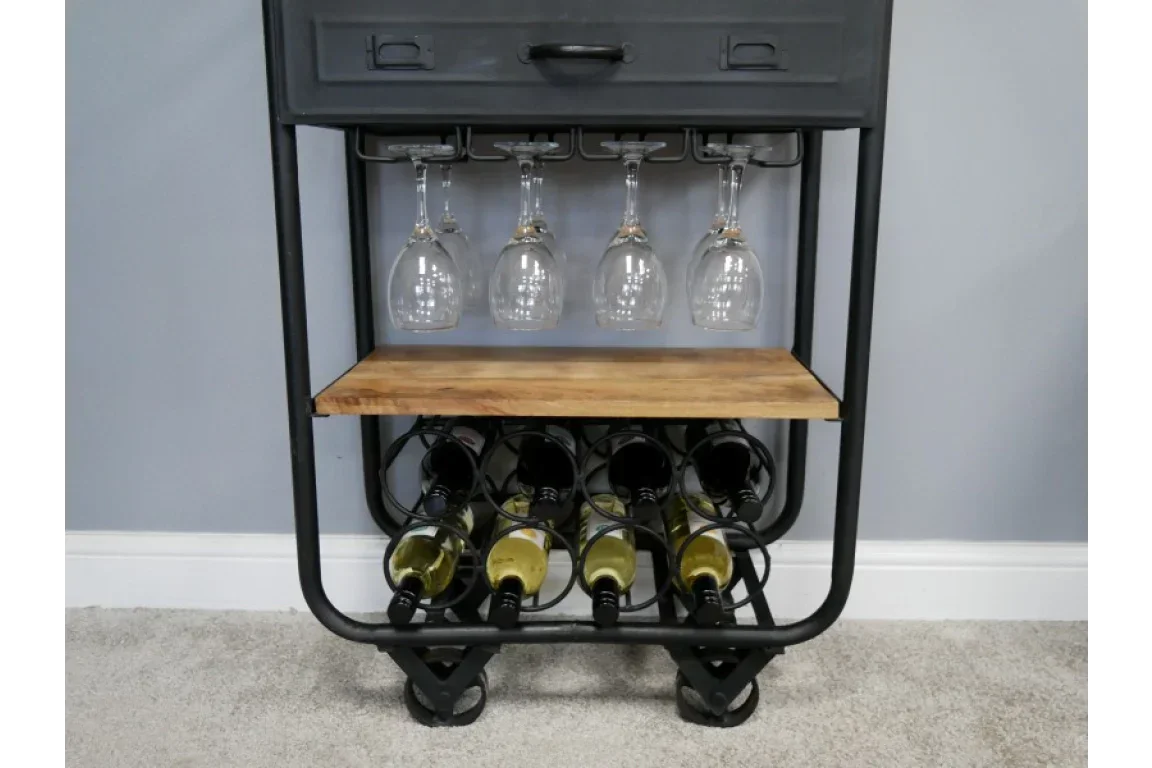 Industrial wine rack with wood shelf, glass holders, and black metal frame against wall
