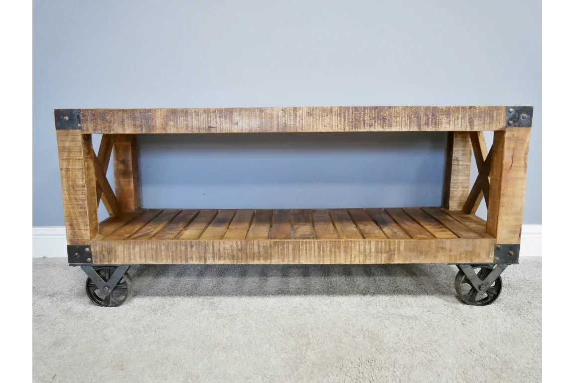 Rustic wooden industrial coffee table with metal caster wheels and open lower shelf