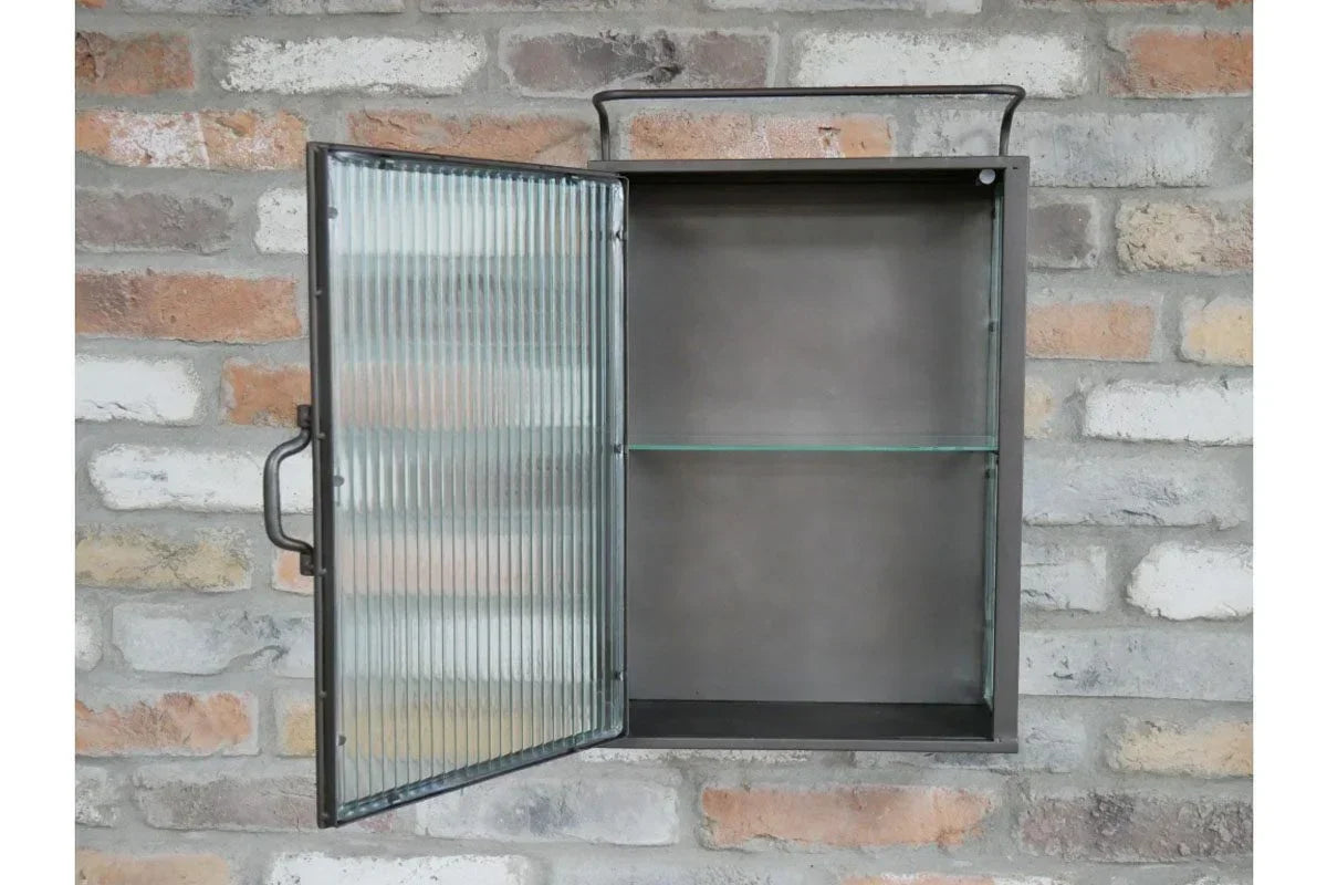 Wall mounted metal display cabinet with ribbed glass door and single glass shelf