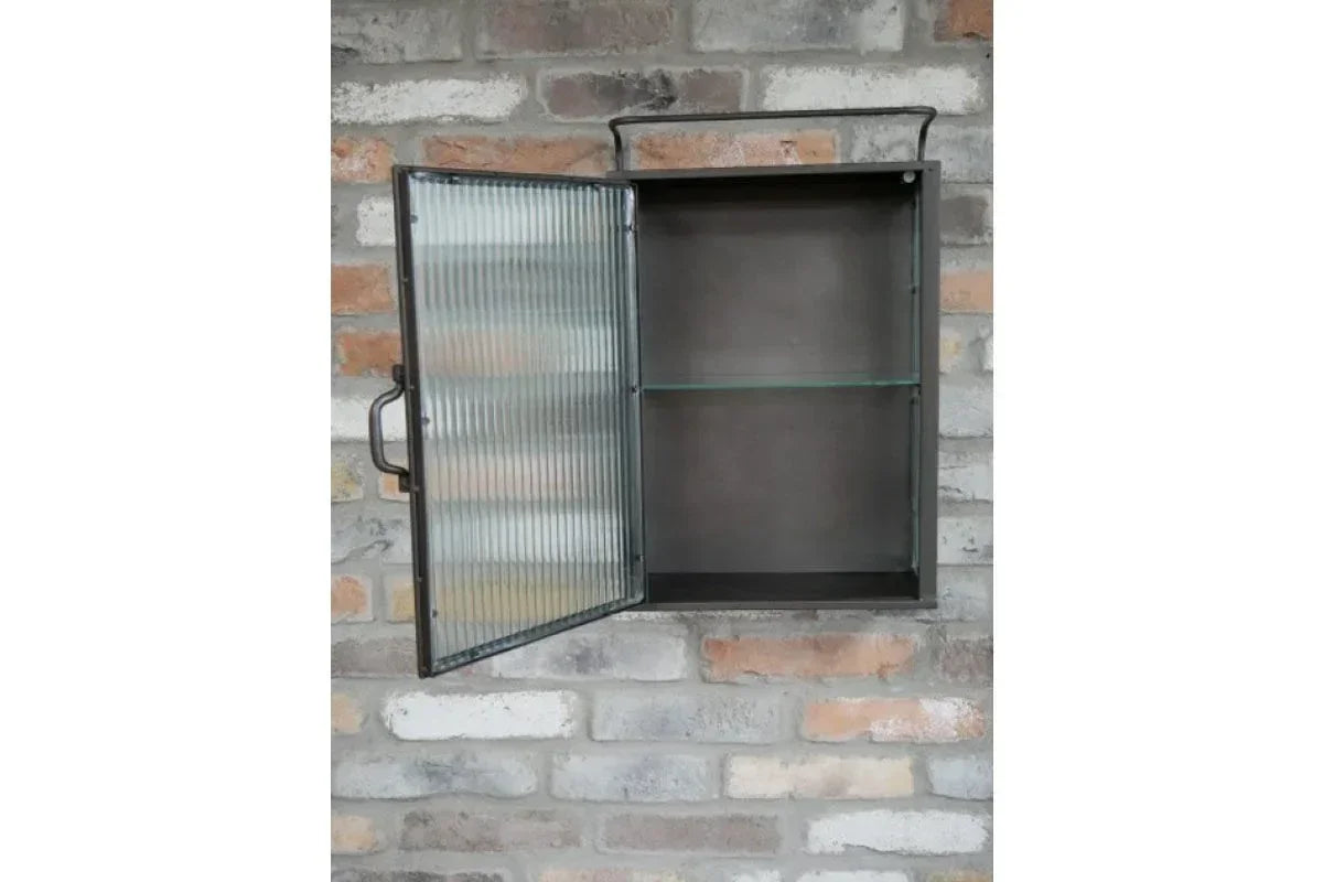 Wall-mounted metal display cabinet with ribbed glass door and single shelf