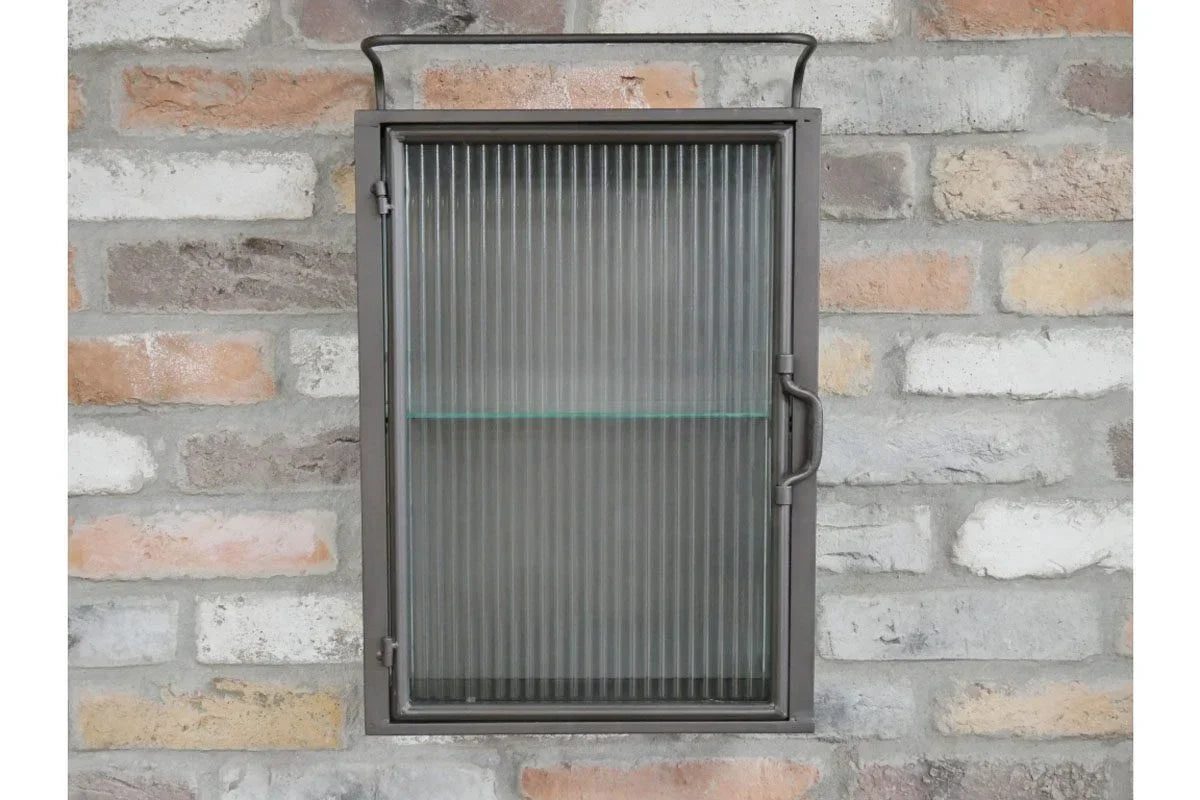 Wall-mounted metal display cabinet with ribbed glass door and single shelf
