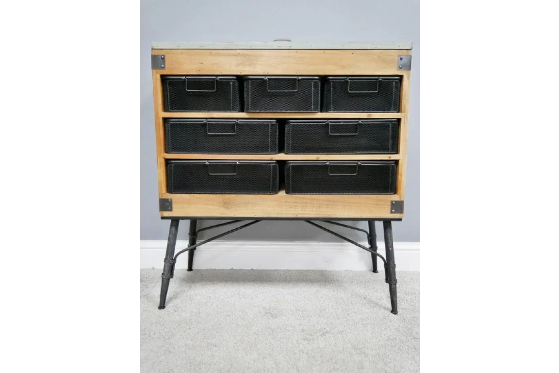 Industrial style storage cabinet with six black mesh drawers and metal legs