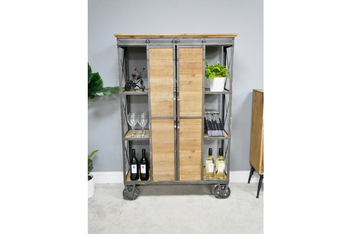 Industrial wood and metal drinks cabinet with shelves, glasses and wine bottles on display