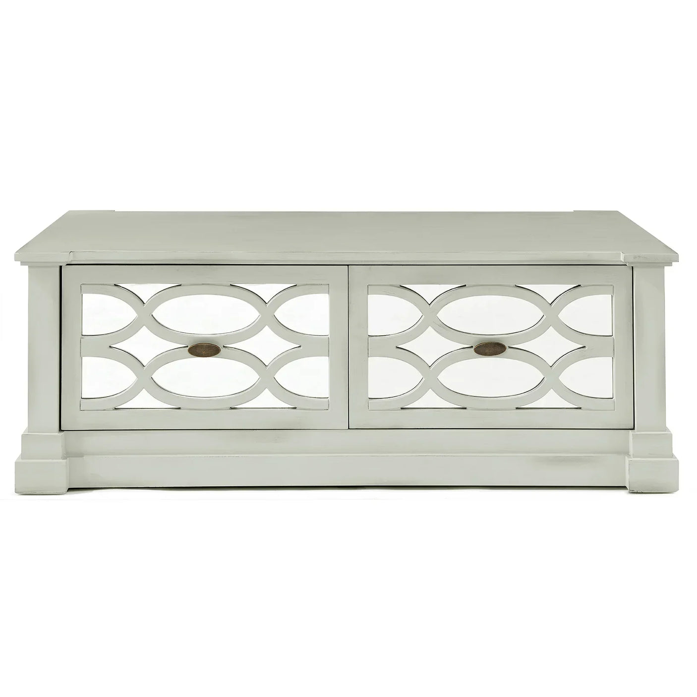 White wooden storage chest with decorative mirrored front and metal handles