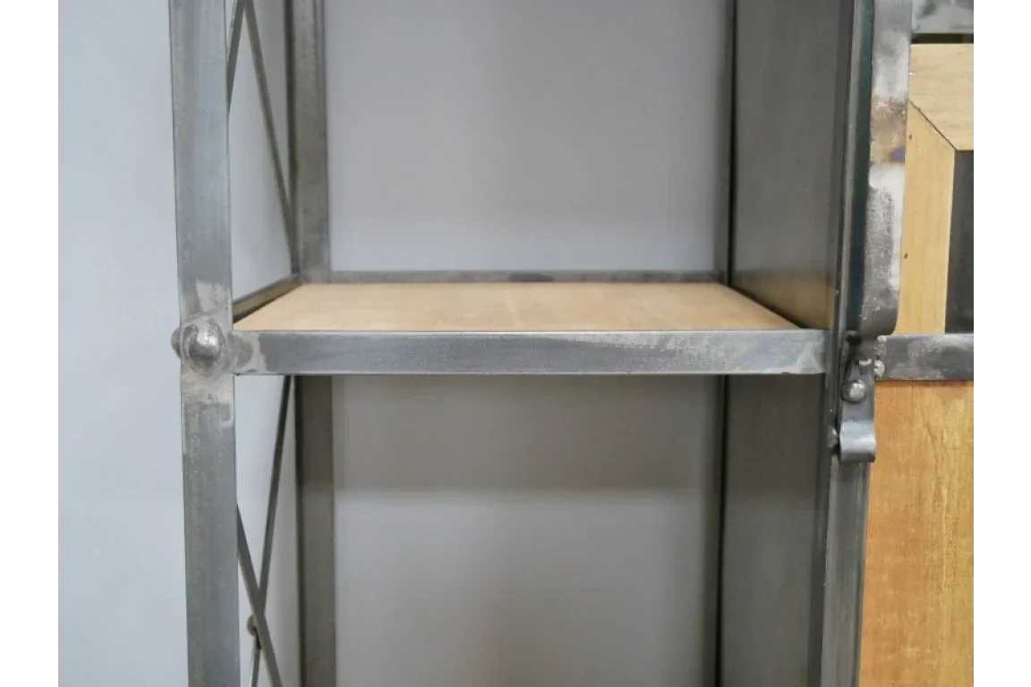 Metal and wood shelving unit with exposed frame and single light wood shelf