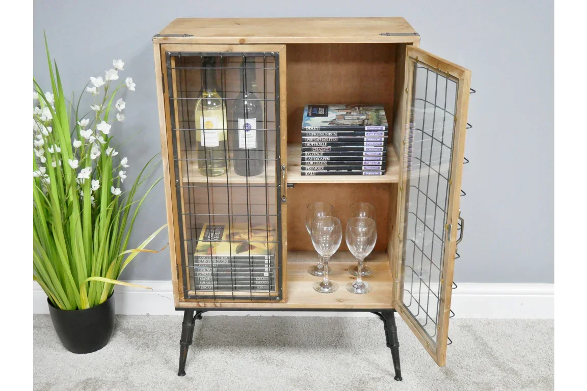 Wooden drinks cabinet with glass door, wine bottles, glasses and books on shelves