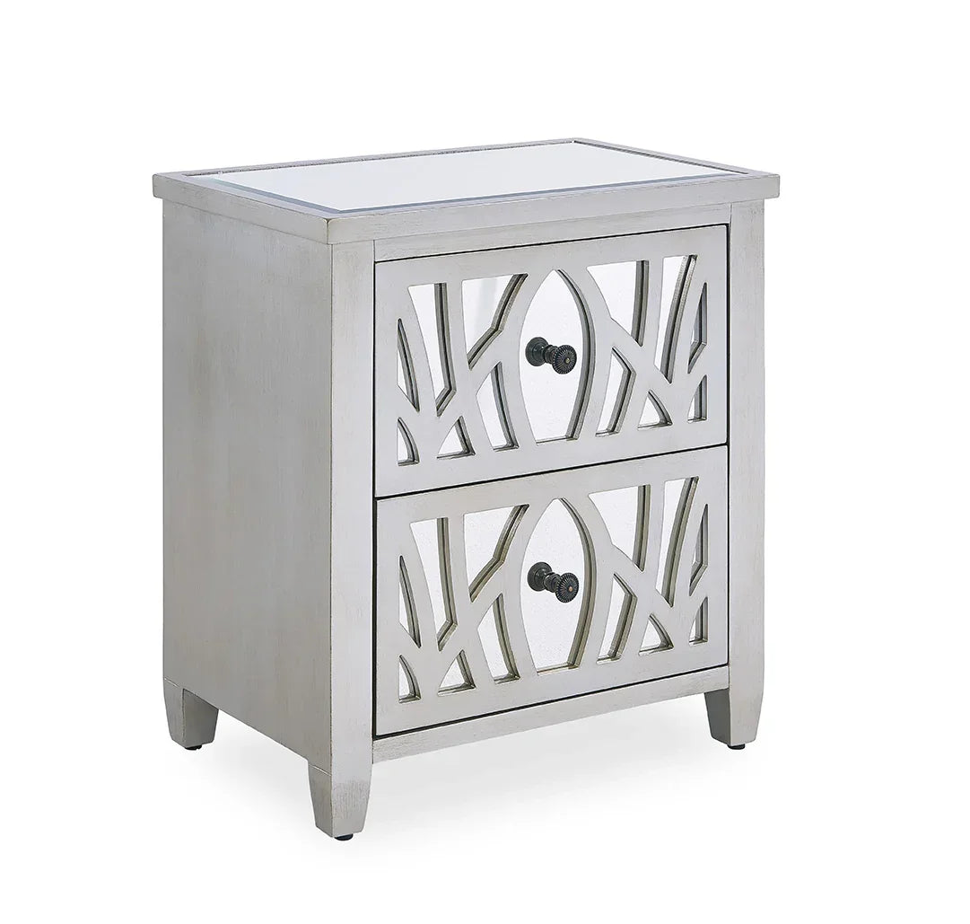 Silver mirrored bedside table with two decorative drawers and black knobs