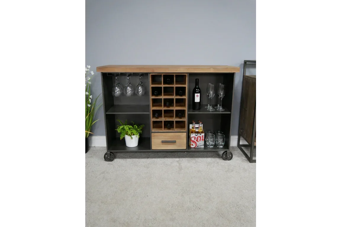 Wood and metal bar cabinet with wine storage, glasses, shelf space and decorative potted plant