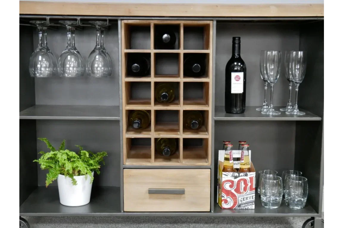 Wooden drinks cabinet with wine rack, glass holder, plant, and shelves for glasses and bottles