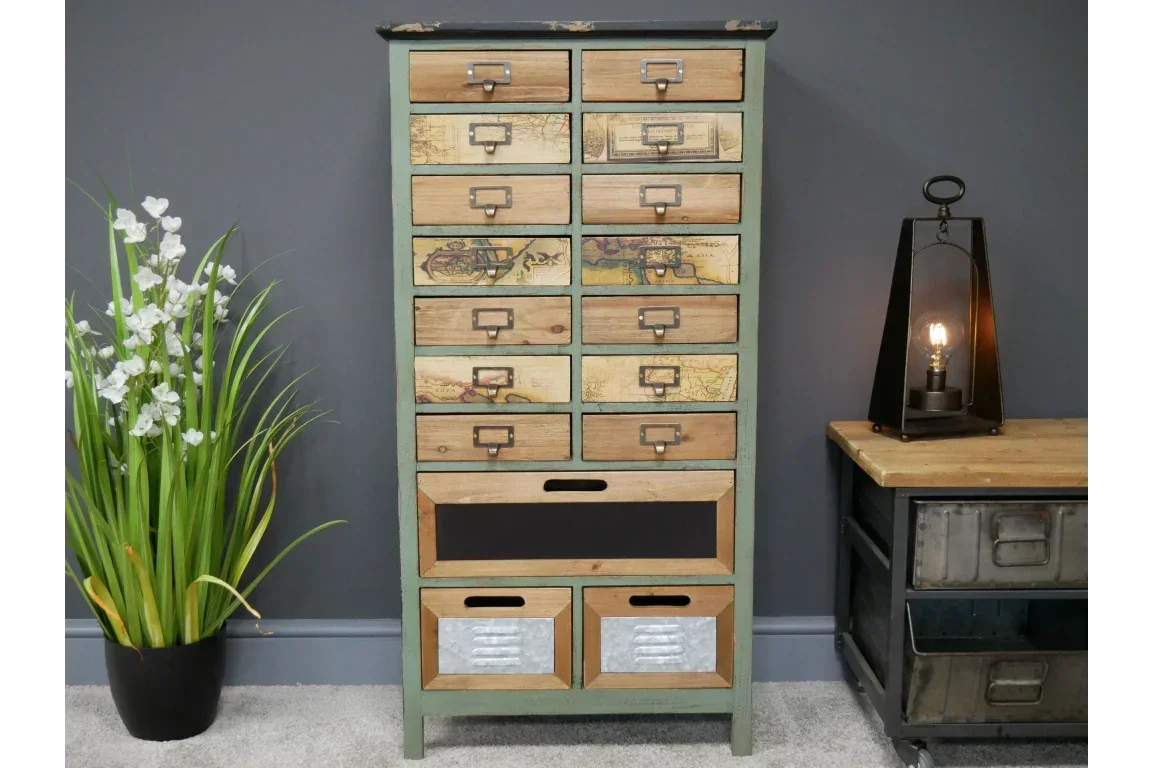 multi-drawer wooden chest with vintage map panels and metal handles against grey wall