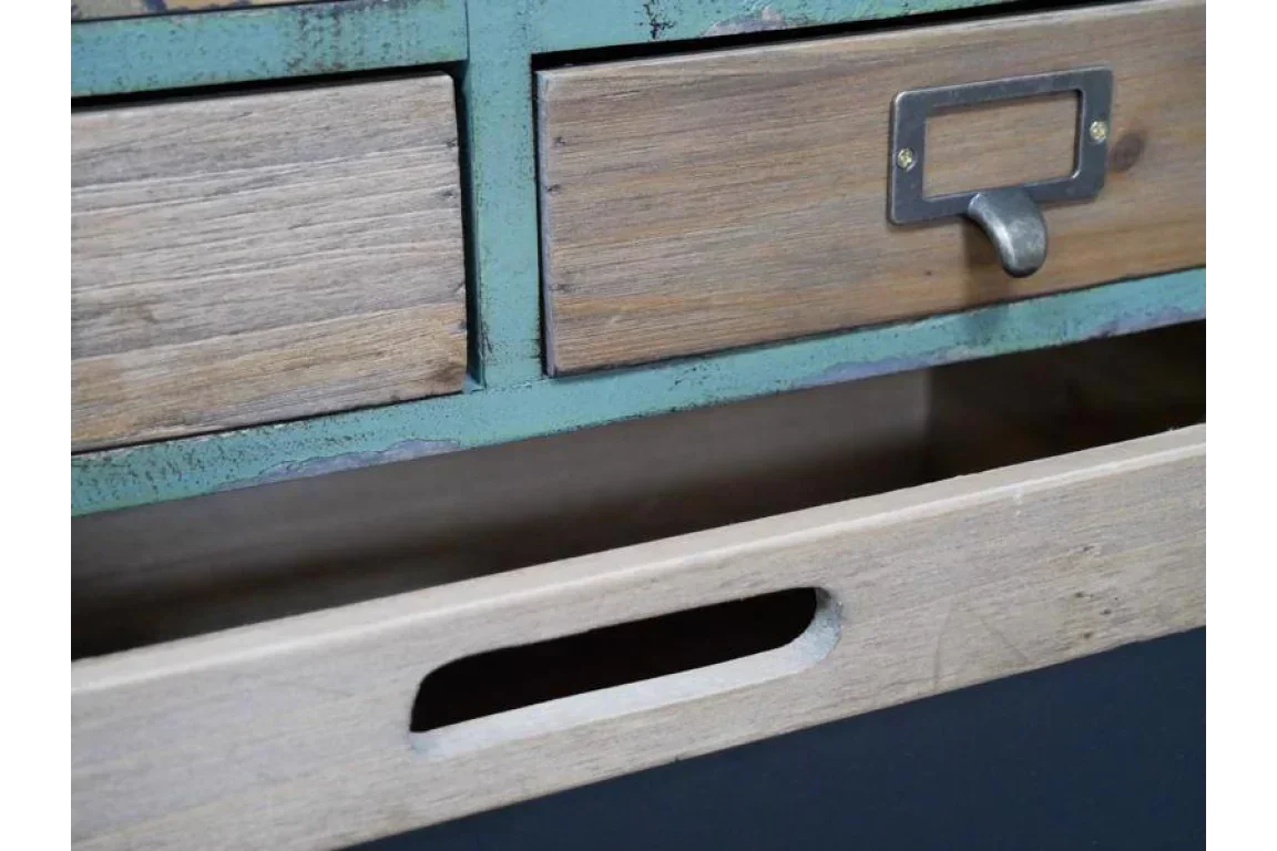 Close-up of wooden storage drawers with metal handle and cut-out pull