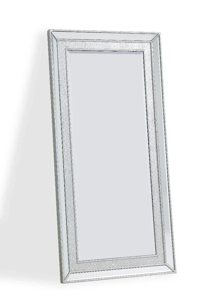 Rectangular wall mirror with beveled glass and silver glitter frame at an angle