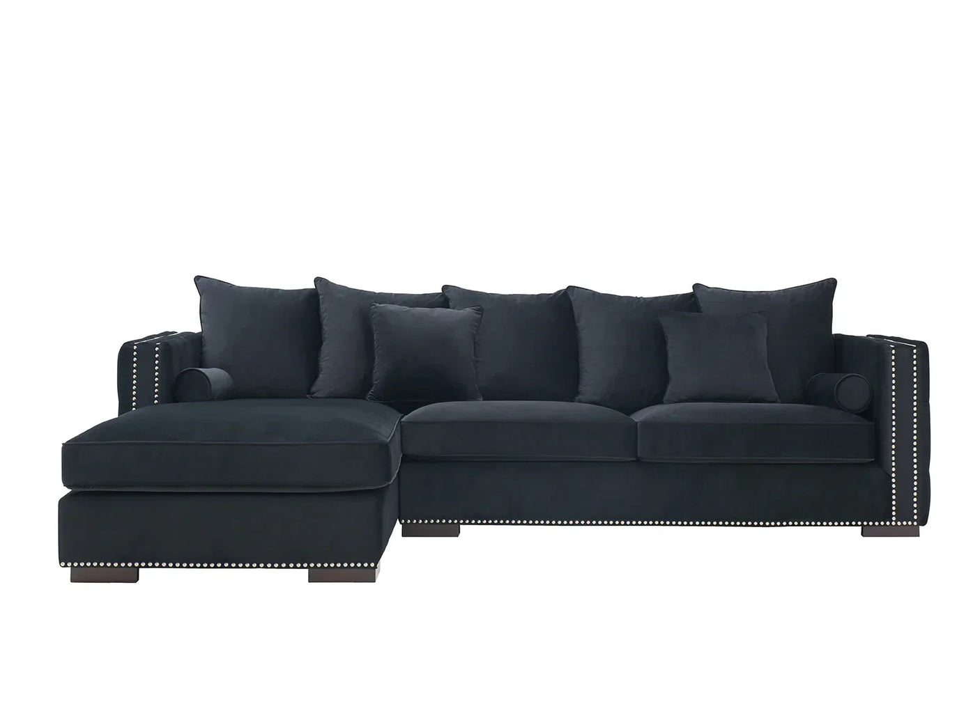 Black corner sofa with studded trim and multiple back cushions on white background