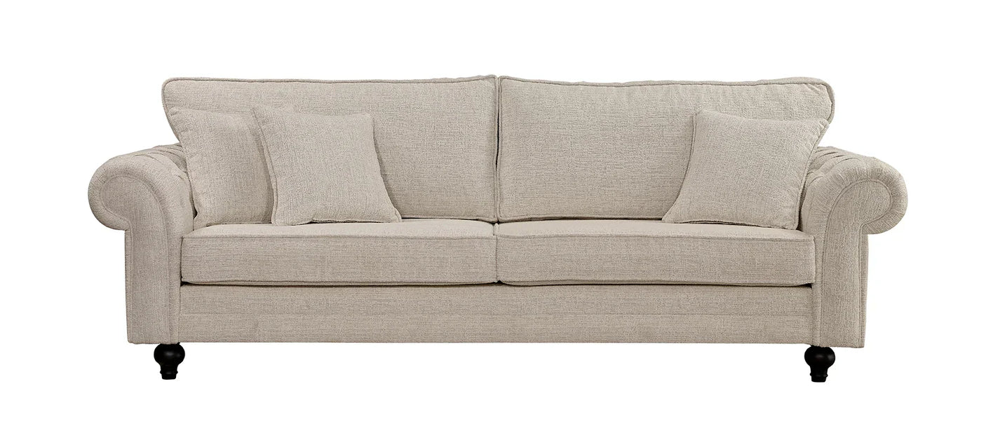 Beige fabric sofa with rolled arms and wooden legs, includes three seat cushions and two pillows