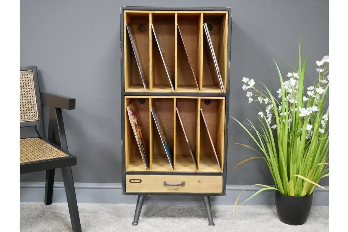 Wooden vinyl storage unit with dividers and metal legs against a grey wall