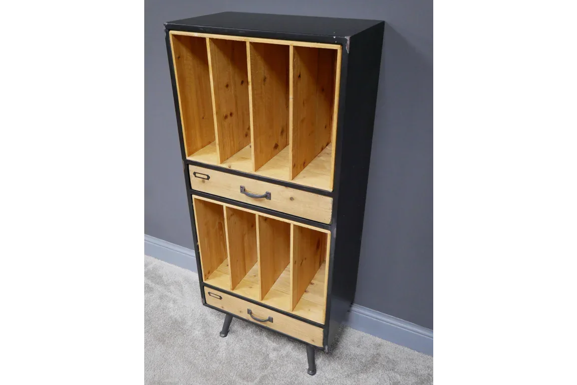 Industrial storage cabinet with divided wooden cubbies and drawers, black metal frame standing