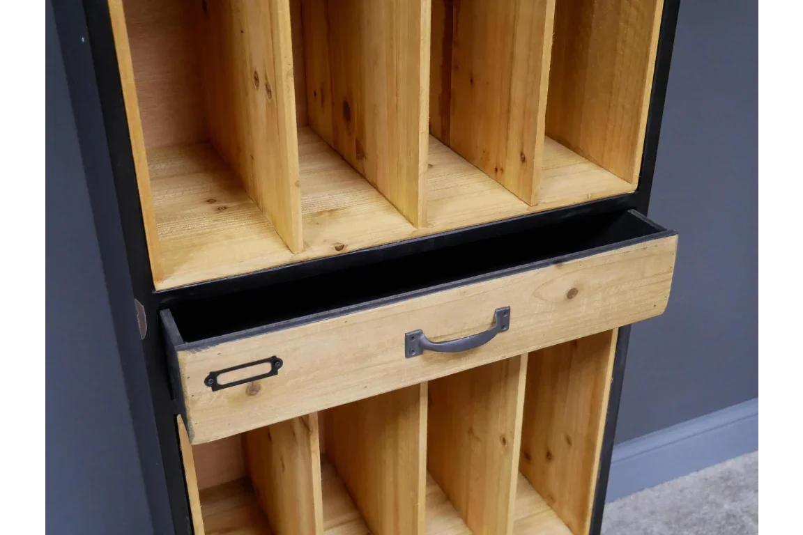 Wooden storage unit with open drawer and multiple vertical compartments