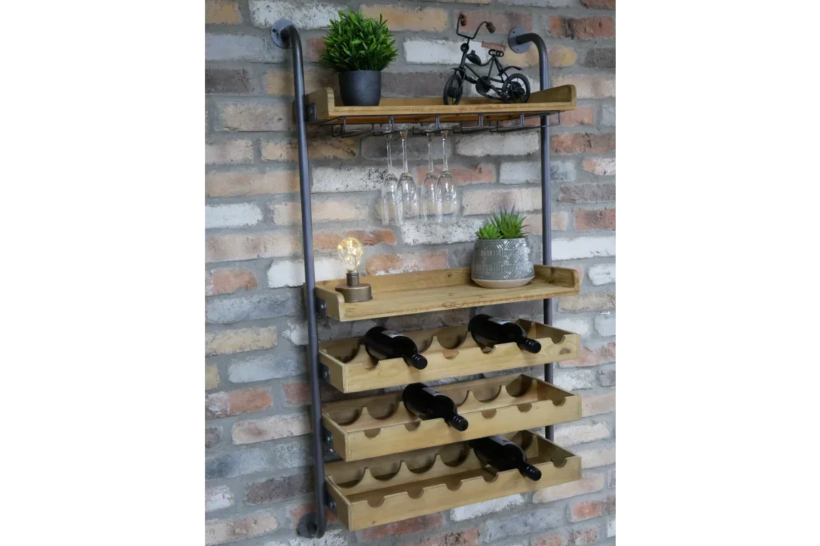 Wall mounted wooden wine rack with shelves, wine bottles, glass holders and decor on brick wall