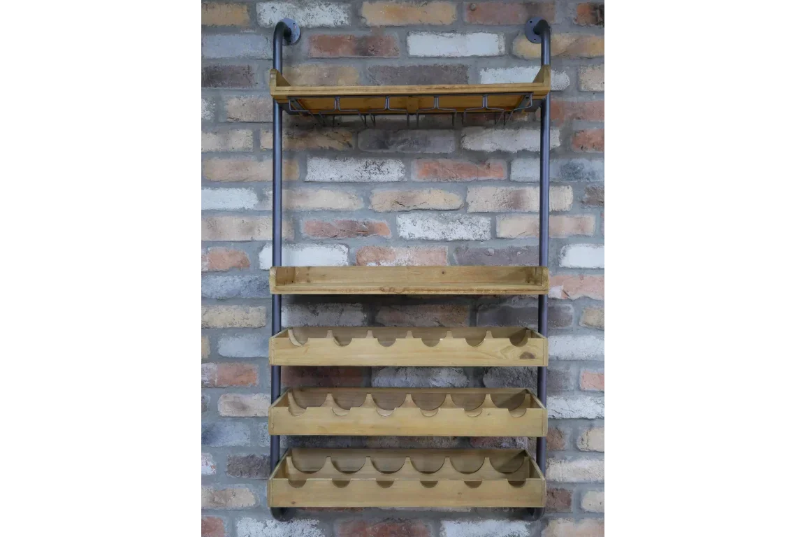 Wall mounted wooden wine rack with metal frame against brick wall, holds multiple bottles