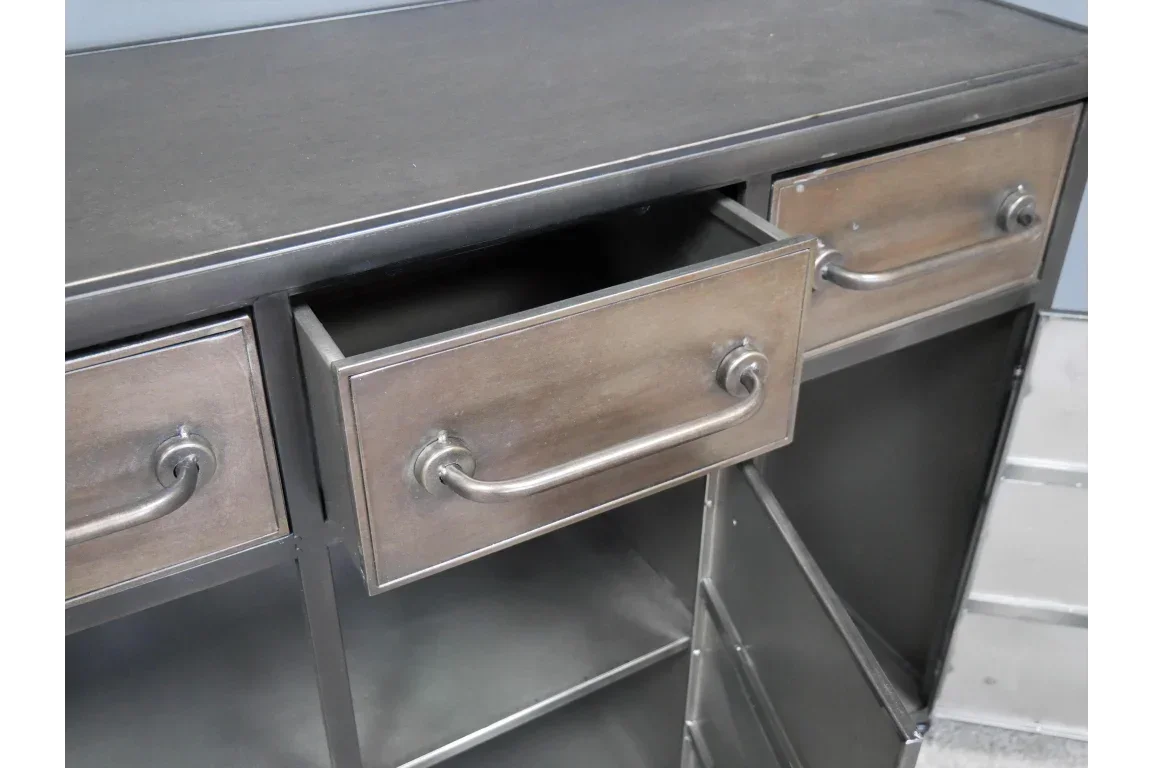 Industrial metal sideboard with three drawers and open shelving, close view of hardware